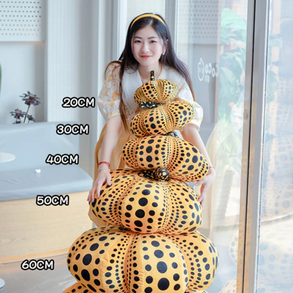 Delightfully Spooky Yayoi Kusama Pumpkin Plushies for Halloween Fun